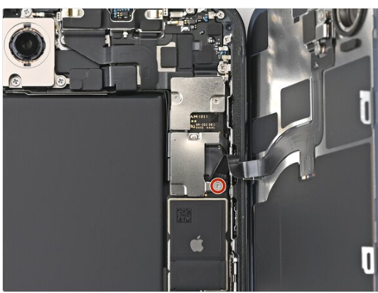 Remove the middle connector cover screw